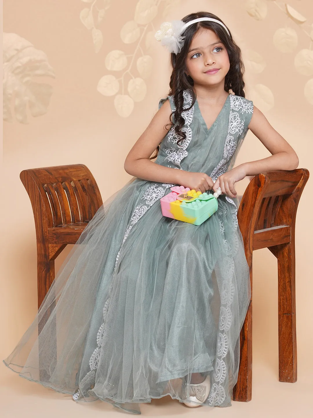 Jashvi Girls Green Net Embroidered Fit & Flare Gown.